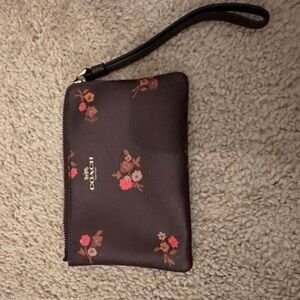 Coach Dark Brown Wristlet with Floral Design